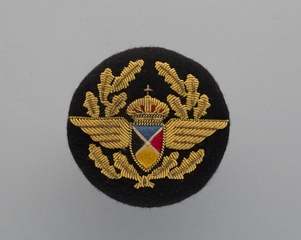 Image: flight officer cap badge: Sabena World Airlines
