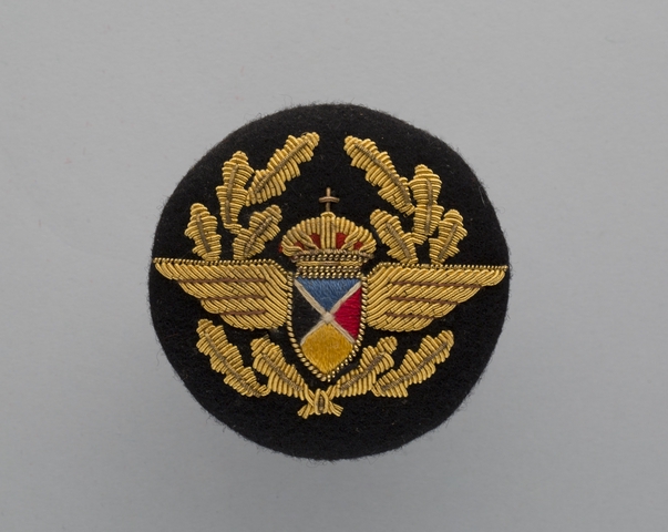 Flight officer cap badge: Sabena World Airlines