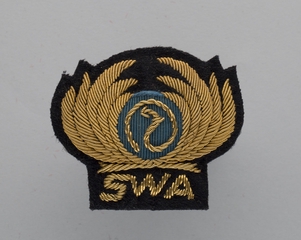 Image: flight officer cap badge: South West Aviation