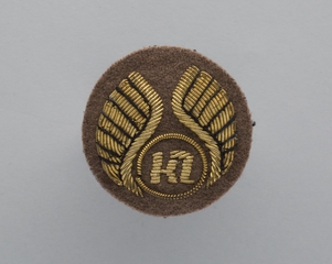 Image: flight officer cap badge: Kenya Airways