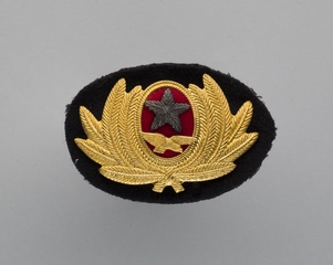 Image: flight officer cap badge: Ansett Australia