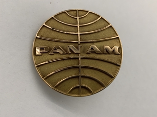 Image: flight officer cap badge: Pan American World Airways