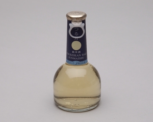 Image: bottle of sake: United Airlines