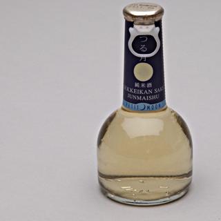 Image #1: bottle of sake: United Airlines