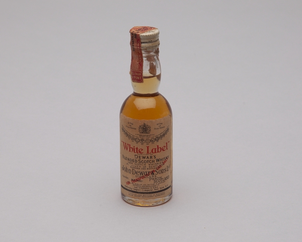 Miniature liquor bottle: general commercial aviation, Dewar’s White Label