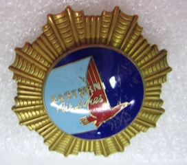 Image: flight officer cap badge: Eastern Air Lines