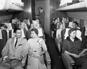 Image: photograph: TWA (Trans World Airlines), air hostess, Lockheed L-1049 Super Constellation