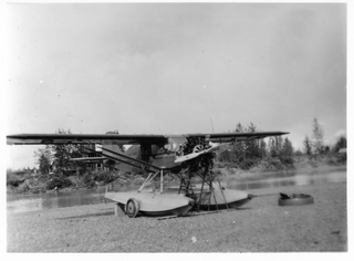 Image: photograph: Pollack Flying Service, Stinson SM-1, Alaska