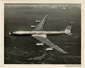 Image: promotional print: Flying Tiger Line, Boeing 707-349C