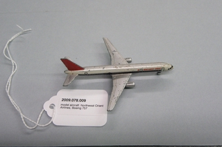 Image: miniature model airplane: Northwest Orient Airlines, Boeing 757