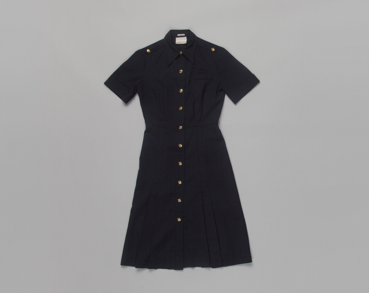 Image: flight attendant dress: Transamerica Airlines