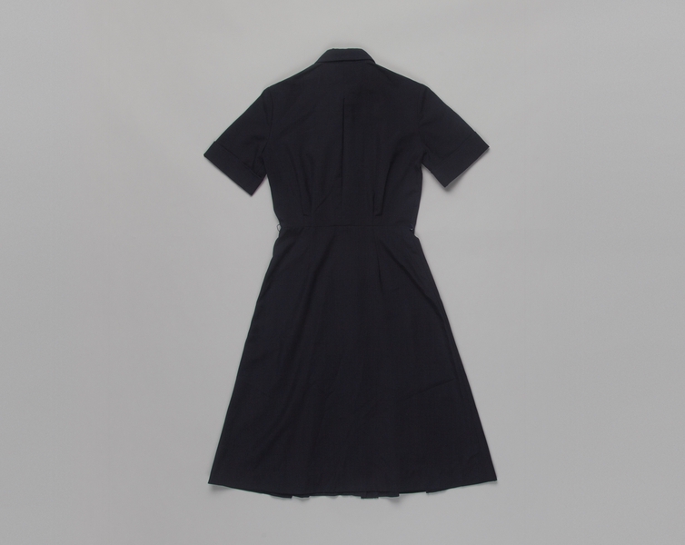 Image: flight attendant dress: Transamerica Airlines