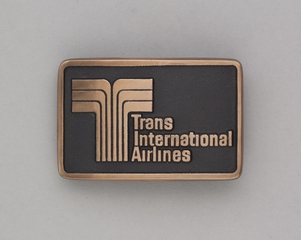 Image: belt buckle: Trans International Airlines