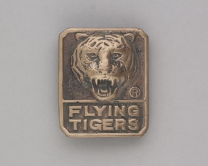Image: belt buckle: Flying Tiger Line