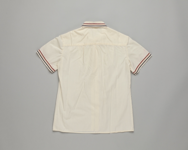 Image: ticket agent blouse: American Airlines