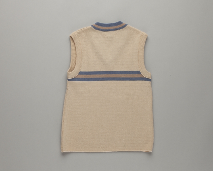 Image: flight attendant sweater vest: Western Airlines