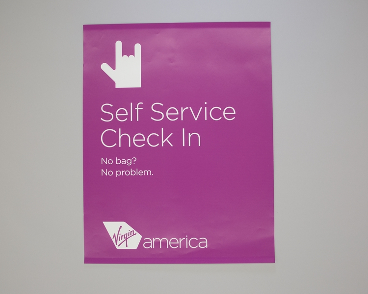 Image: sign: Virgin America, check-in