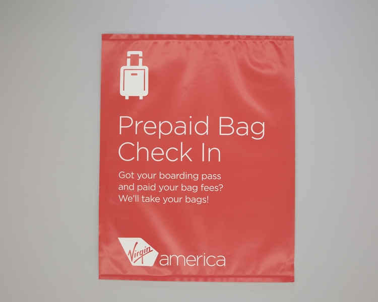 Image: sign: Virgin America, check-in