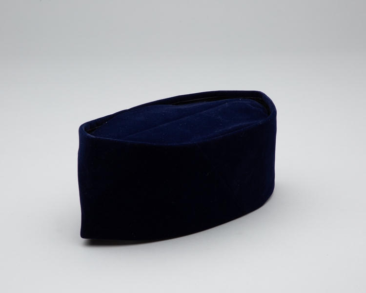 Image: flight attendant hat: Garuda Indonesia