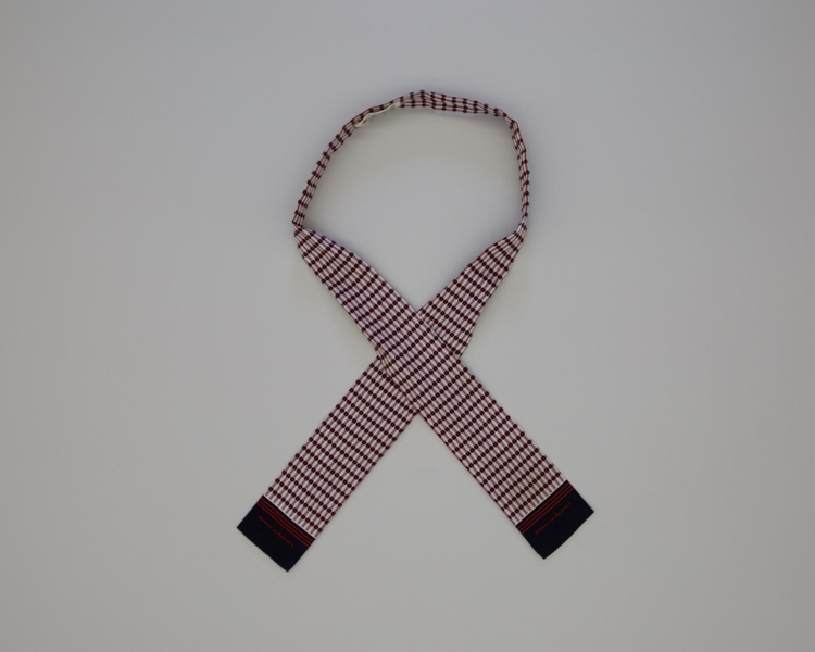 Image: flight attendant bow tie: American Airlines