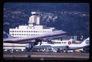 Image: slide: San Francisco International Airport (SFO), Central Terminal and United Airlines Boeing 747