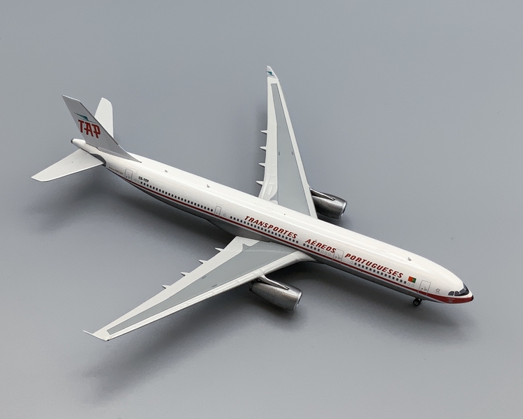 Image: miniature model airplane: TAP (Transportes Aereos Portugueses), Airbus A330-300