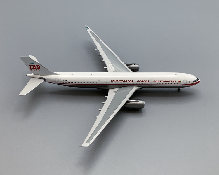 Image: miniature model airplane: TAP (Transportes Aereos Portugueses), Airbus A330-300