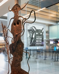 Image: Installation view of "The Enduring Spirit of Haitian Metal Sculpture"