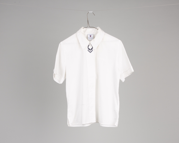 Image: ticket agent blouse: American Airlines