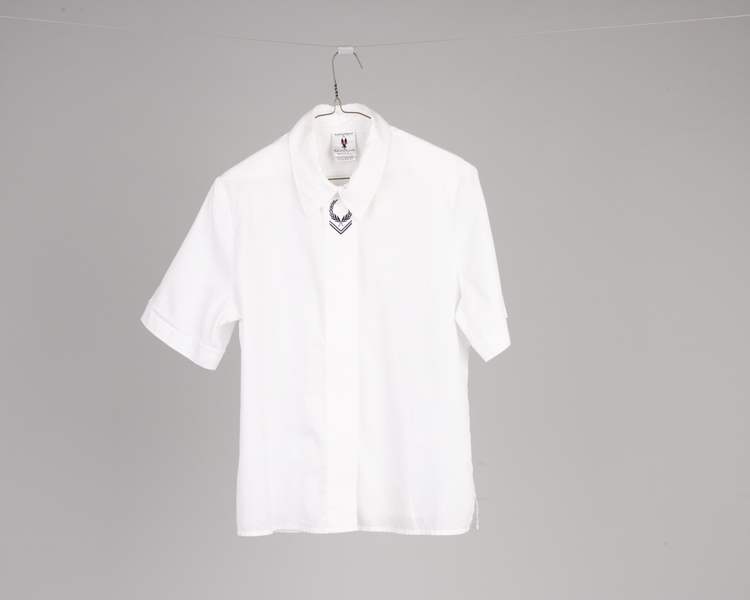 Image: ticket agent blouse: American Airlines
