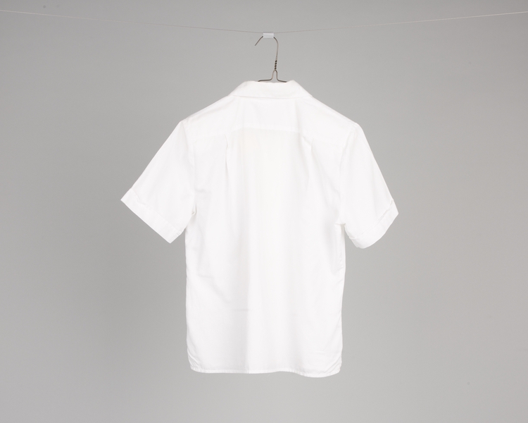 Image: ticket agent blouse: American Airlines