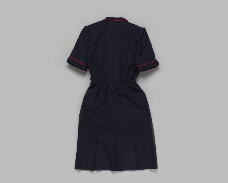 Image: ticket agent dress: American Airlines