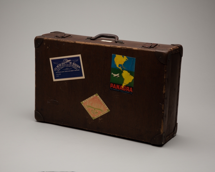 Image: suitcase: with reproduced Mexicana de Aviación, SCADTA, and PANAGRA luggage labels
