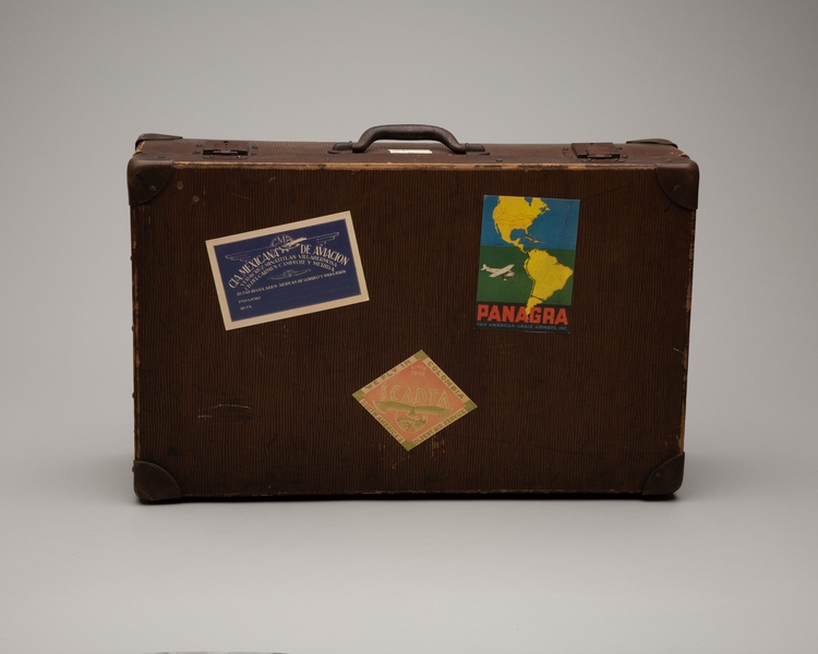 Image: suitcase: with reproduced Mexicana de Aviación, SCADTA, and PANAGRA luggage labels