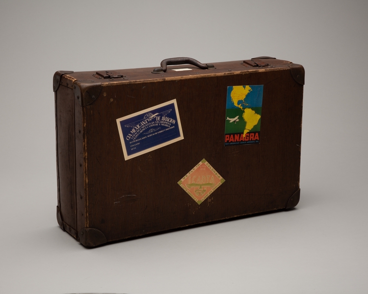 Image: suitcase: with reproduced Mexicana de Aviación, SCADTA, and PANAGRA luggage labels