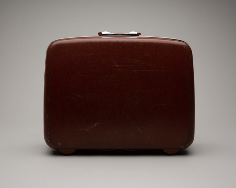 Image: crew suitcase: United Airlines (rust colored)