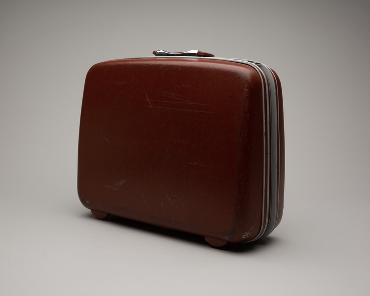 Image: crew suitcase: United Airlines (rust colored)