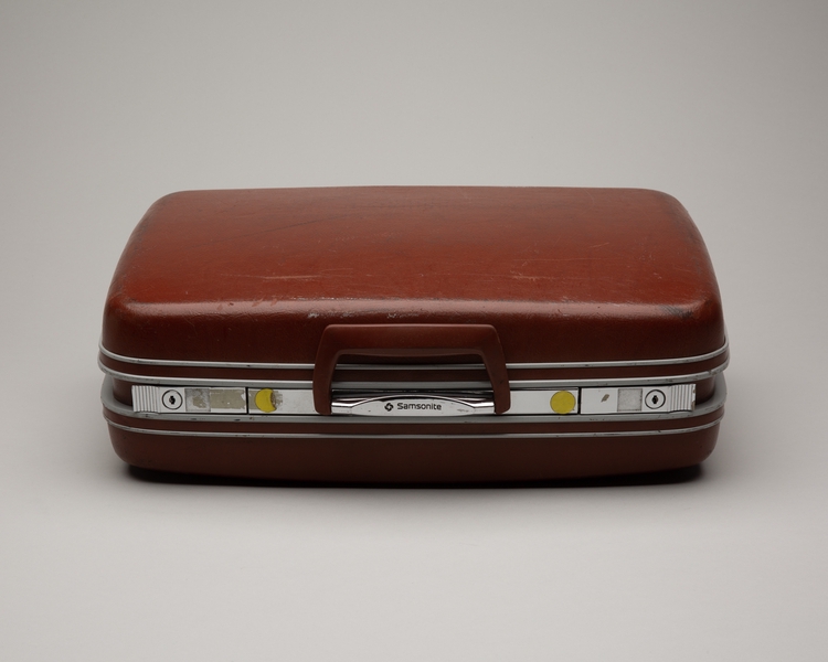 Image: crew suitcase: United Airlines (rust colored)