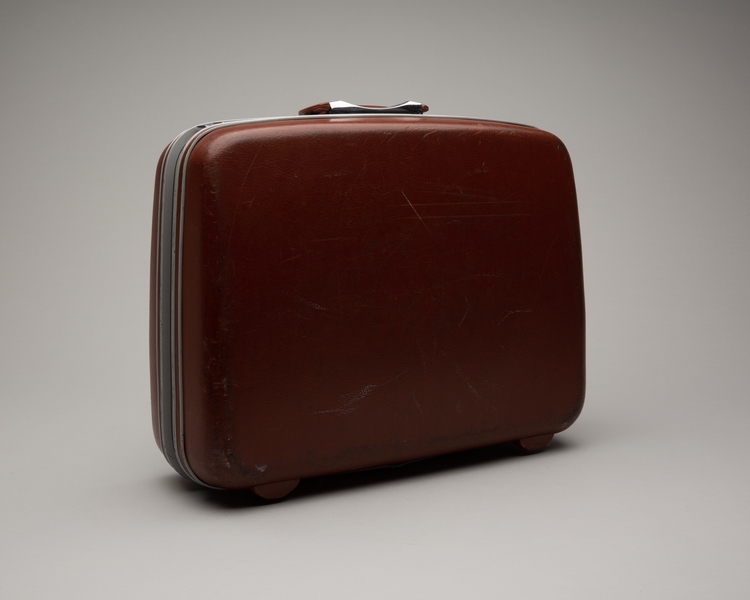 Image: crew suitcase: United Airlines (rust colored)
